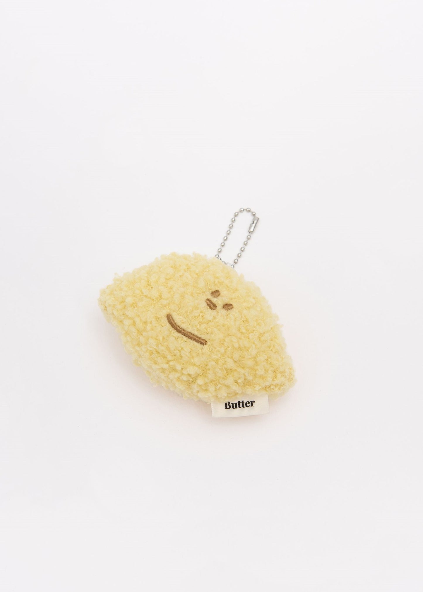 BUTTER Fluffy Lemon Boy Keychain