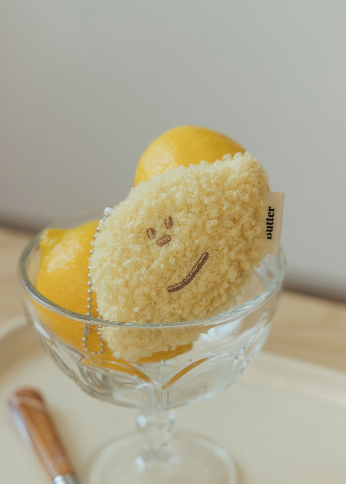 BUTTER Fluffy Lemon Boy Keychain