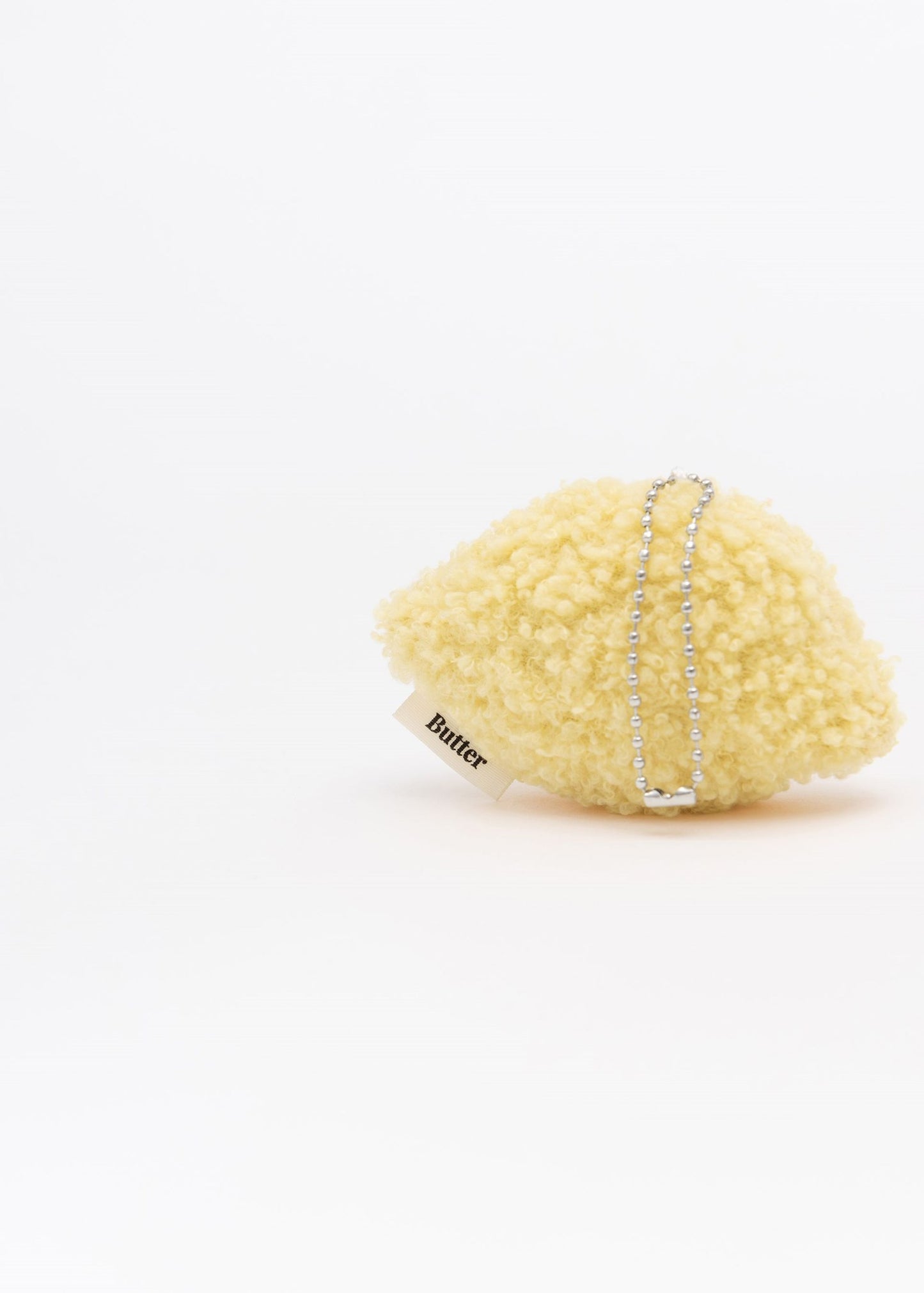 BUTTER Fluffy Lemon Boy Keychain